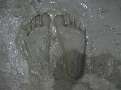 Barefoot in Wet Cement Footprints